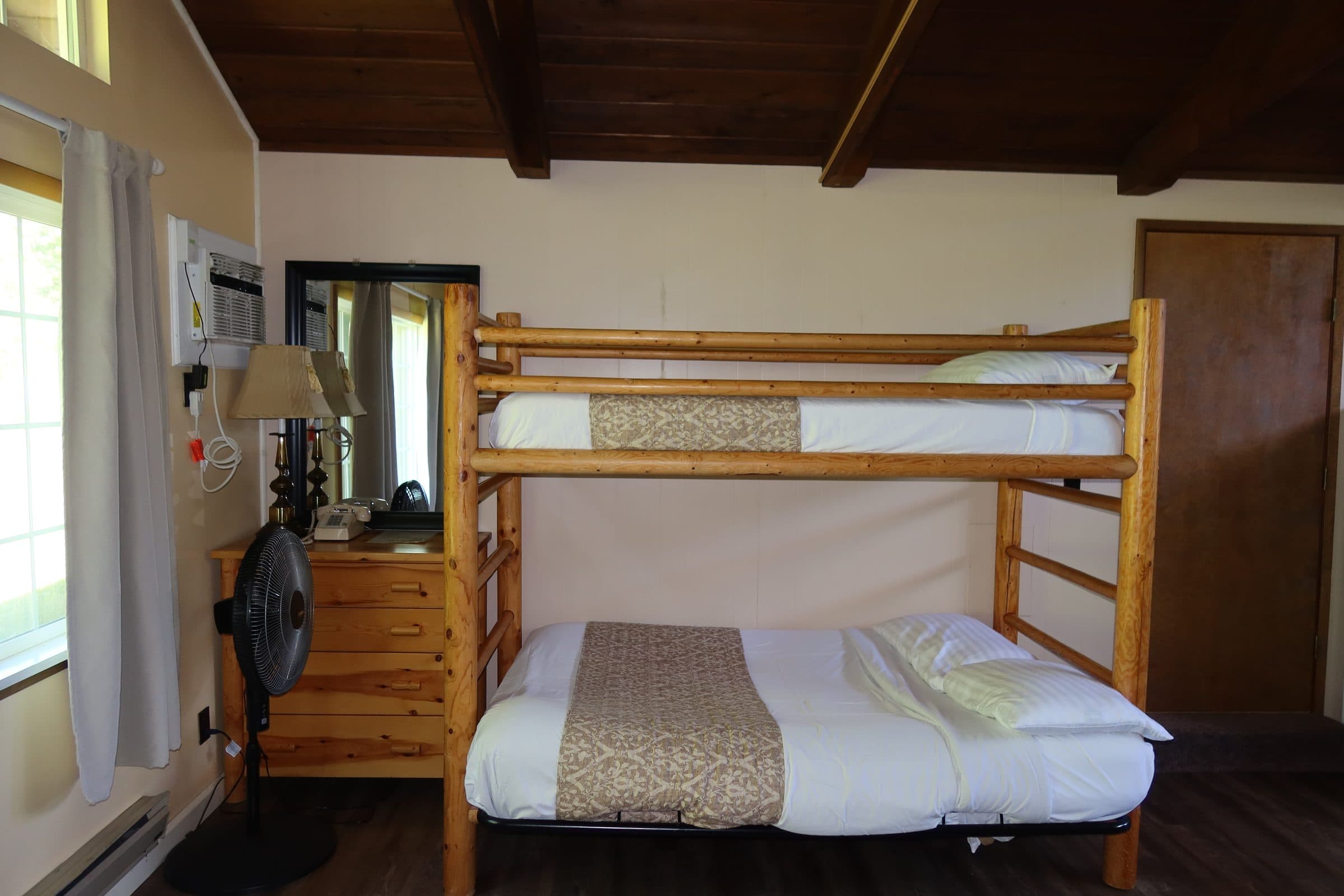 Room #15 interior with 2 queen beds and 1 bunk bed