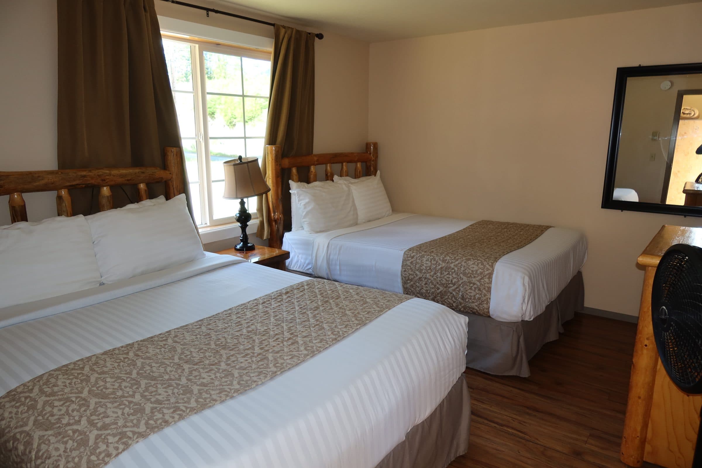 Room #18 interior with 2 queen beds and 1 sofa bed